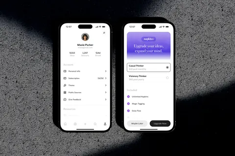 Two iPhone 16s displaying the Napkin app. One shows user profile and settings, the other subscription upgrade options.
